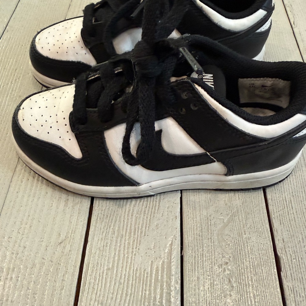 Nike Kids Black and White Low-Top Sneakers with Swoosh Accent